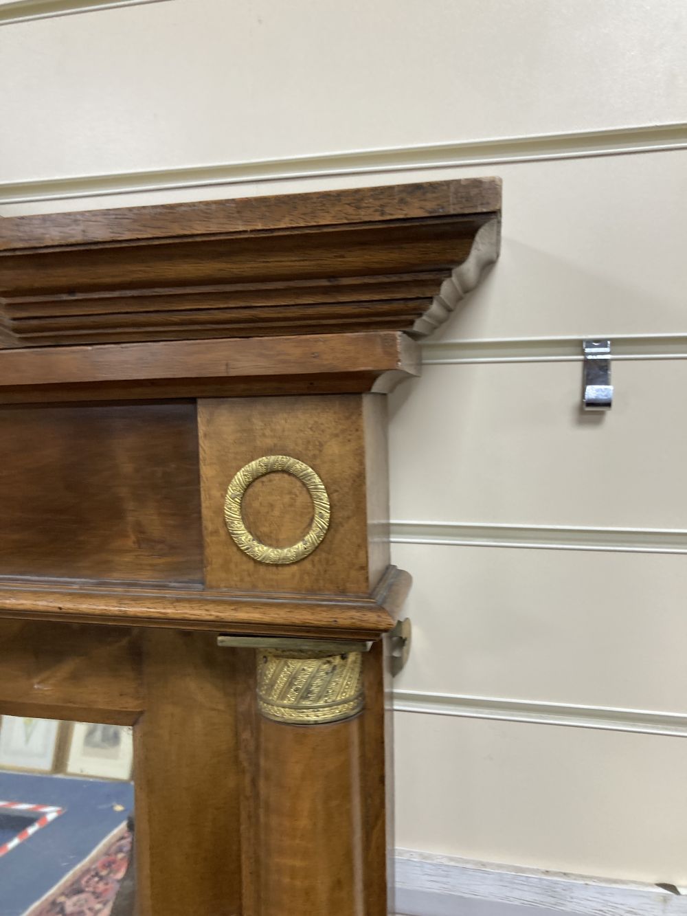 An Empire style mahogany gilt metal mounted overmantel mirror, width 125cm height 190cm